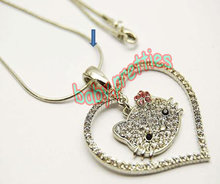 Prachtige zilverkleurige ketting met harthanger, hello kitty kopje